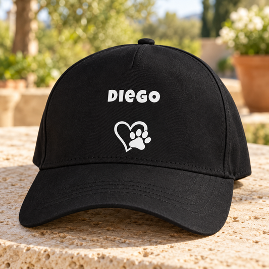 Black cap with the dog name “Diego” and a heart with a paw print.