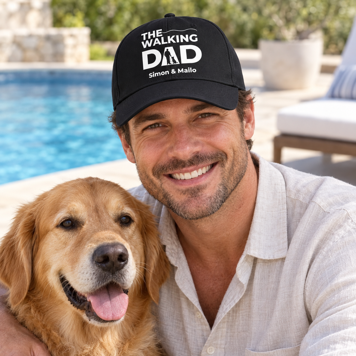 Black cap with “THE WALKING DAD” print and personalized names, worn by a man with a dog.