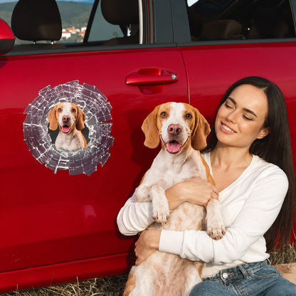 Personalized car sticker with dog picture and broken-glass design on a red car door.