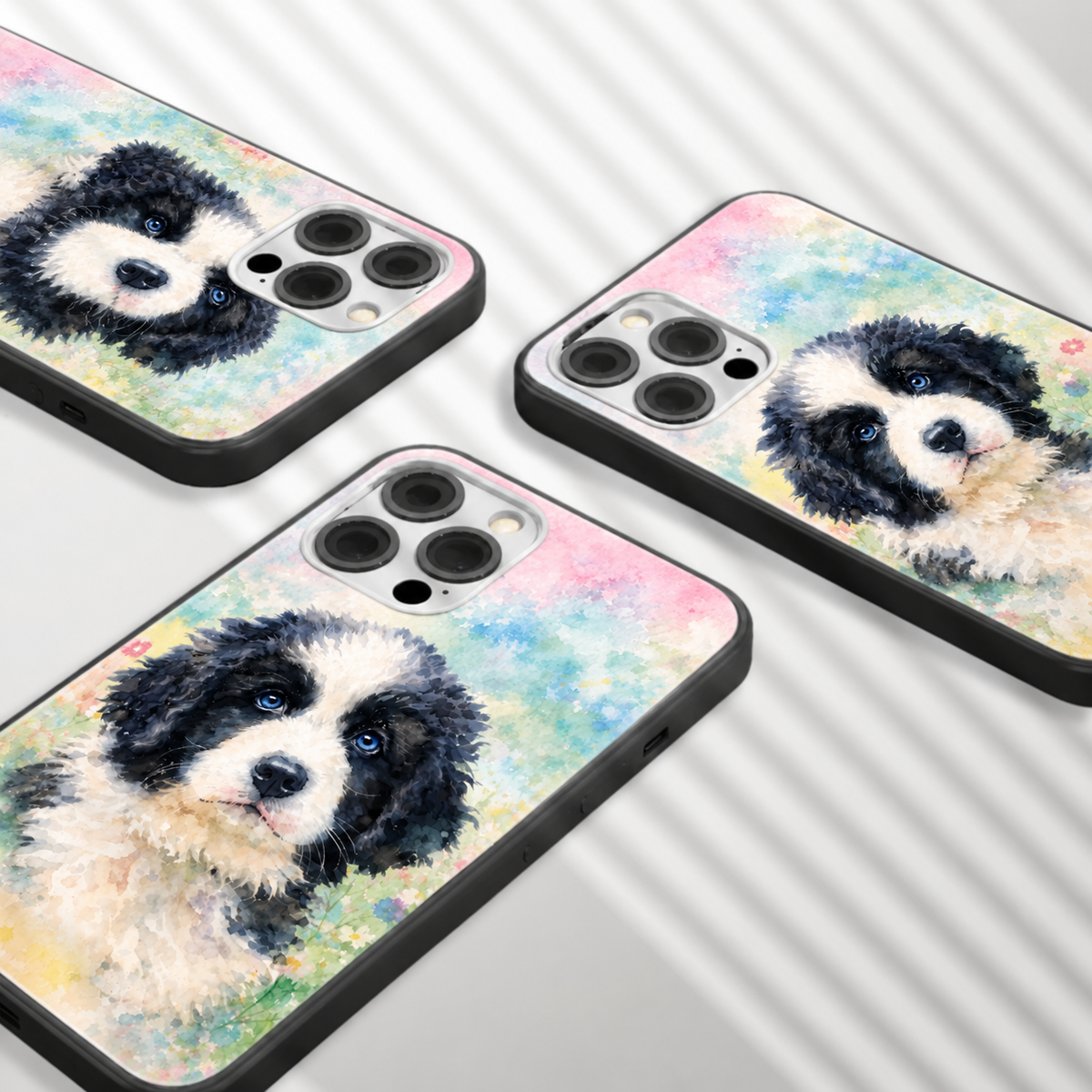 Three personalized phone cases with colourful watercolour dog designs.