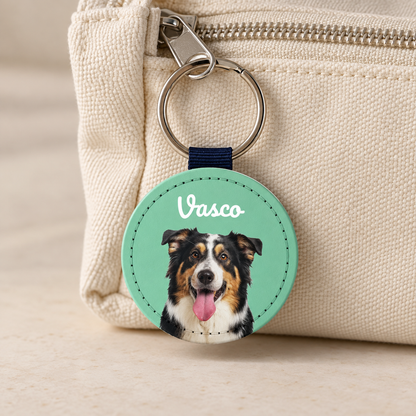 Personalized keychain with a dog pet portrait, green and black colours, extra name "Vasco".