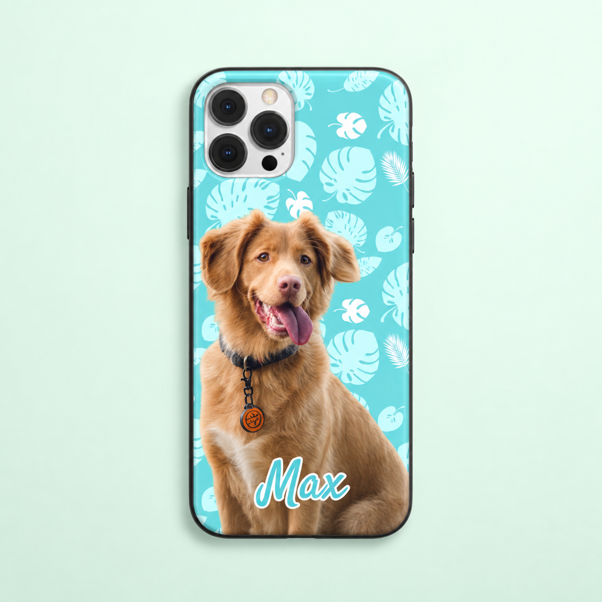 Personalized phone case with photo of a dog on a turquoise patterned background.