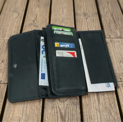 Black suede-look wallet, open, with card slots and space for banknotes.