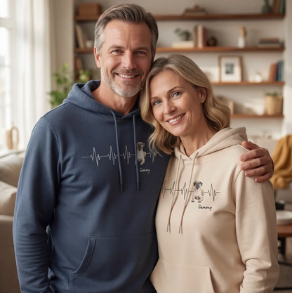 Personalized hoodies in blue and beige with heartbeat design and dog illustration.