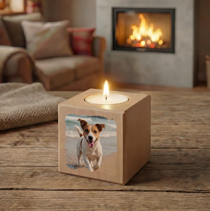 Personalized light wood candle cube with a dog photo and burning wick.